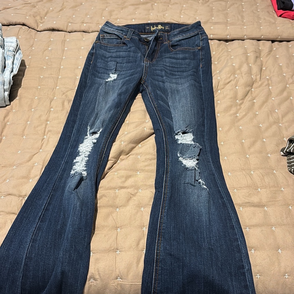 Distressed Blue Jeans